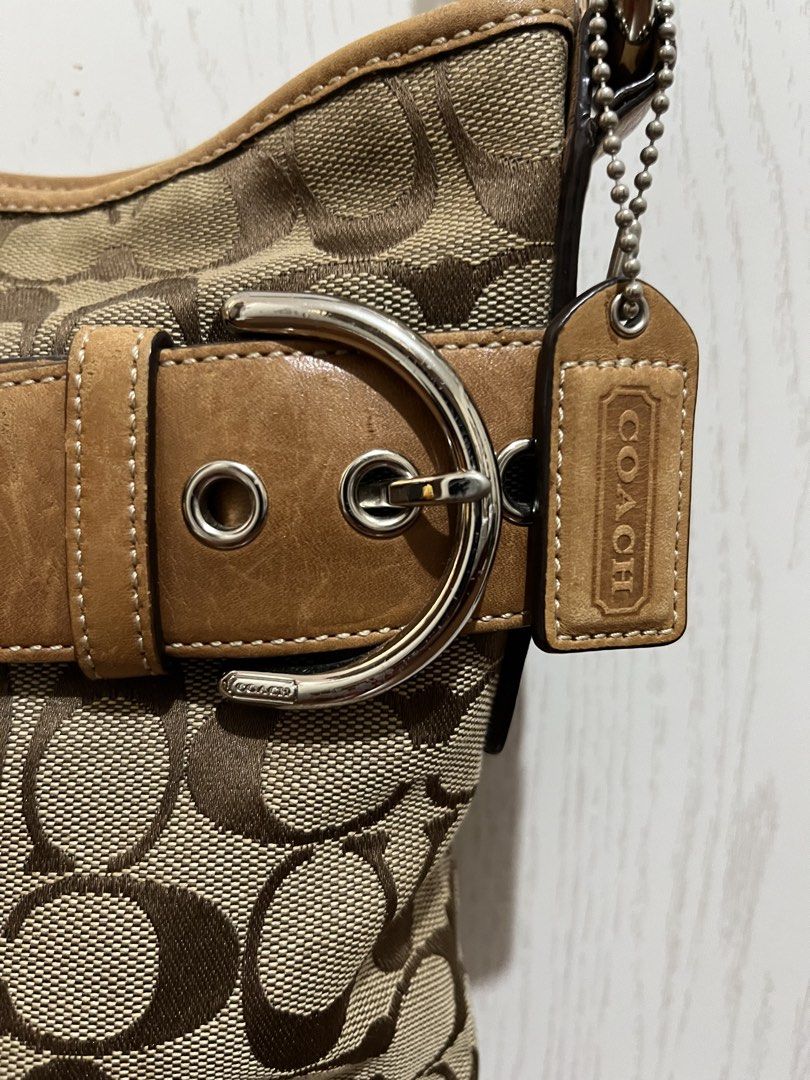 Coach Vintage Signature Shoulder/crossbody bag (Category: Luxury Bags & Wallets) located in Bacolor. Submitted by livephoenix (Listing ID 1452117431, Image 2). Description: - Authentic Classic Coach monogram canvas crossbody bag - Tan leather trim and strap - Silver hardware with buckle details - Secure zipper closure - Interior zippered pocket and slip pockets - Visible serial number inside - Ideal for everyday use - Bought from Japan.
