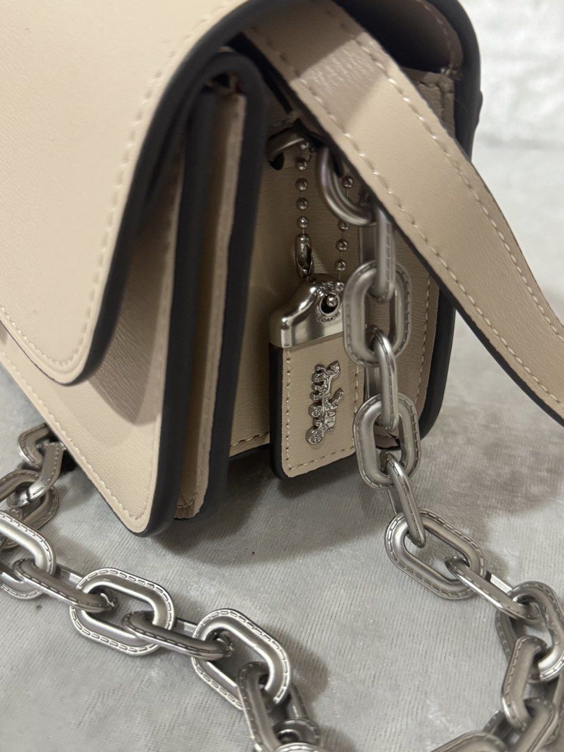 Coach Tabby Shoulder Bag 26 Beige (Category: Luxury Bags & Wallets) located in Davao. Submitted by ela00000 (Listing ID 1452299881, Image 3). Description: - Authentic Coach Tabby shoulder bag - Color: Beige - Straps: Chain strap and leather strap included - Hardware: Silver tone with iconic Coach C logo closure - Interior: Multiple compartments and a zip pocket - Price: P15,000 - Ideal for everyday wear - used only once pag punta ko ng Taiwan las