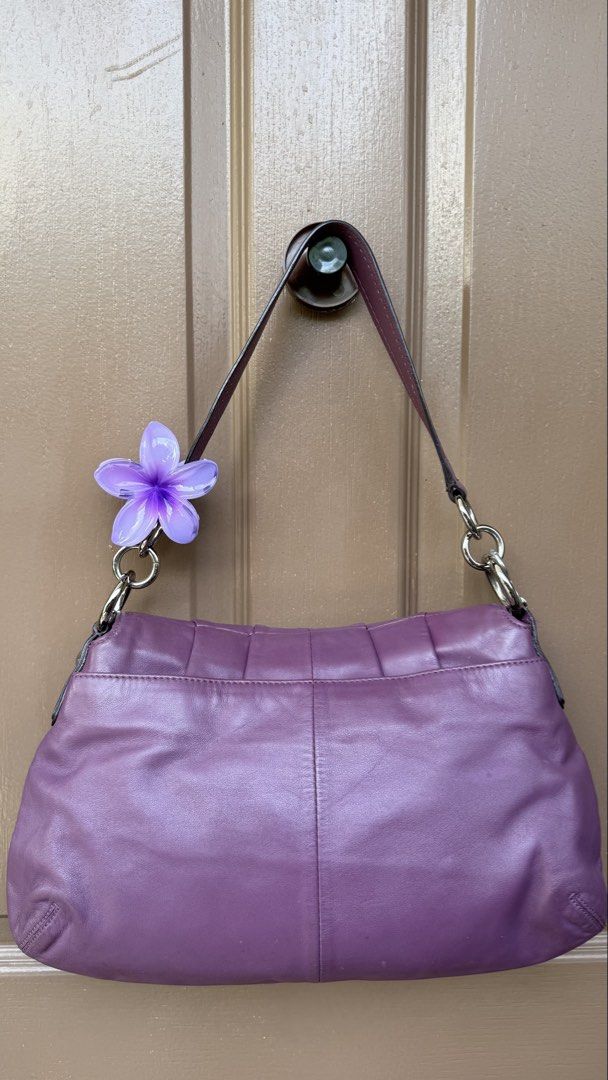 Coach Vintage Soho (Category: Shoulder Bags) located in Taguig. Submitted by xoxovintagechic (Listing ID 1452276778, Image 2). Description: This bag is turning 15 years old 💜 Charm is included Medium size spacious good condition Price drop from 9.5k PLEASE LOOK CAREFULLY AT ALL PHOTOS AS THEY ARE PART OF THE DESCRIPTION..