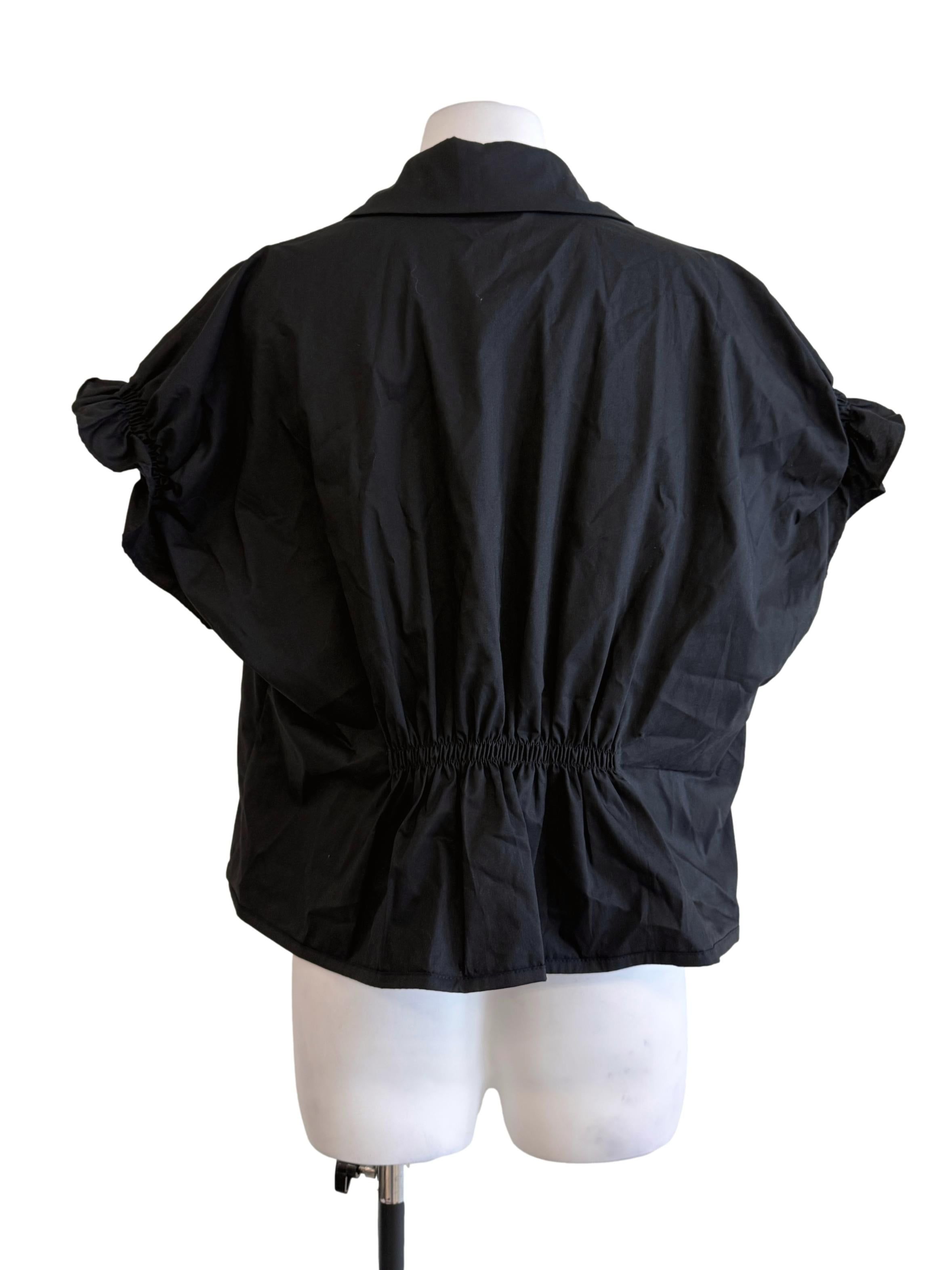 COS Black Collared Casual Blouse (Category: Blouses) located in Kuala Lumpur. Submitted by refashmy (Listing ID 1452305430, Image 2). Description: [Brand] COS [Description] Functional Buttons No Pockets Non Stretchable Material [Measurements] Size L PTP - 21'' Waist - 18'' Length - 22'' [Condition] Lose Thread Button Area Please allow 0.5-1 inch difference in our given measurements. Any variance within this range may not be considered as a reason