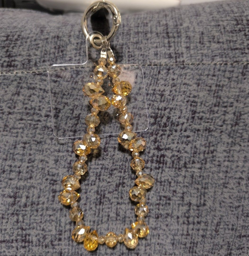 Cute Beaded Keychain with Charms (Category: Other Mobile & Gadget Accessories) located in Imus. Submitted by nhot21 (Listing ID 1452242599, Image 2). Description: 135.00 each - Handmade beaded keychain - Features colorful beads and cute charms (bear, flowers) - Option for amber or clear crystal beads - Perfect accessory for phones, bags or keys - Unique and stylish design.