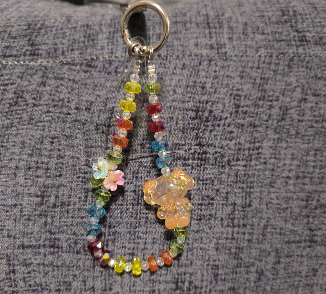 Cute Beaded Keychain with Charms (Category: Other Mobile & Gadget Accessories) located in Imus. Submitted by nhot21 (Listing ID 1452242599, Image 1). Description: 135.00 each - Handmade beaded keychain - Features colorful beads and cute charms (bear, flowers) - Option for amber or clear crystal beads - Perfect accessory for phones, bags or keys - Unique and stylish design.