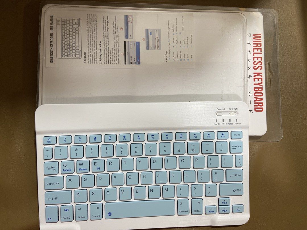 Daiso Wireless Bluetooth Keyboard with USB Charging Cable (Category: Computer Keyboard) located in Manila. Submitted by kimjongin (Listing ID 1452198599, Image 1). Description: - White and light blue wireless Bluetooth keyboard - Bluetooth 5.0 connectivity - Compatible with Windows, iOS, and Android devices - Built-in rechargeable battery - Includes USB charging cable - Ideal for travel and everyday use.
