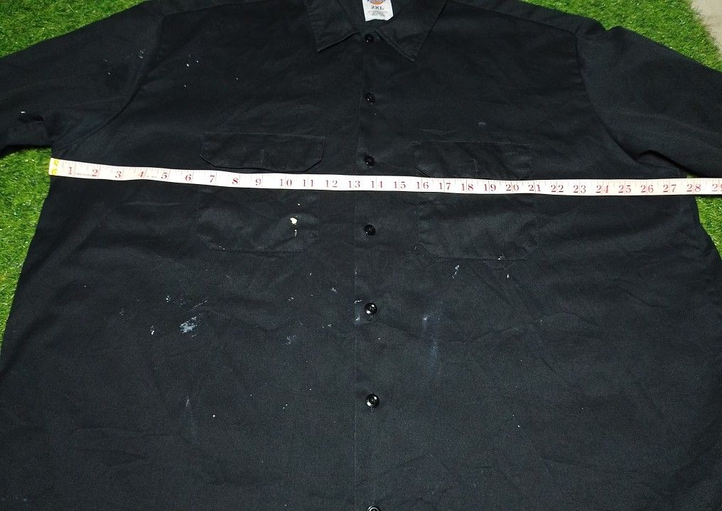 Dickies 2XL Black Long Sleeve Work Shirt (Category: Tshirts & Polo Shirts ) located in Manila. Submitted by patrickjos06722 (Listing ID 1452199690, Image 3). Description: - Dickies Work Shirt - Size: 2XL - Style: Long Sleeves - Features: Two chest pockets with button closures, button-up front - Condition: Some paint marks on the front and back - one visible hole - Versatile: Great for work or casual wear.