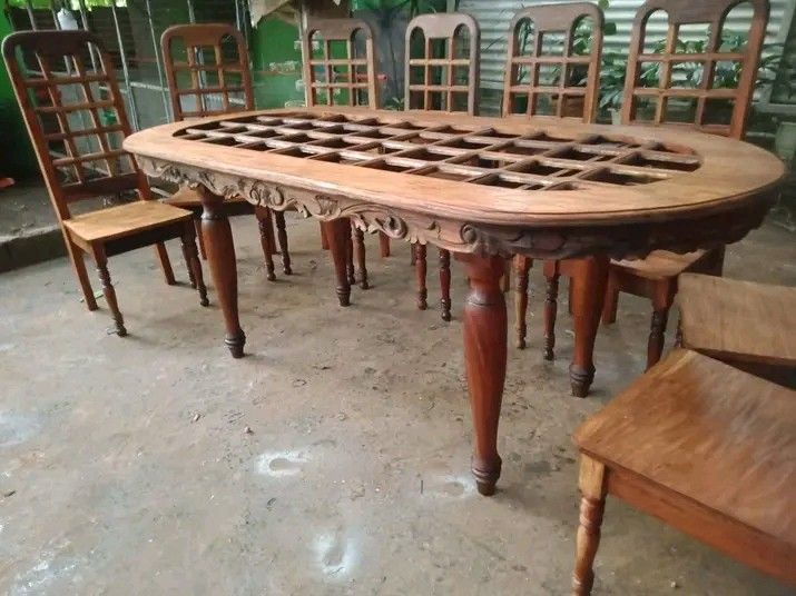 Dining table 8seaters (Category: Tables & Sets) located in Manila. Submitted by carmelites36250 (Listing ID 1452243363, Image 3). Description: Old dining set with clear glasstop (8 seaters) Made of narra wood Newly stripped & varnished Size: Table L80 W36 H32inch Chair L 17W 17 H 17.44.5inch Price: 30,500 set.