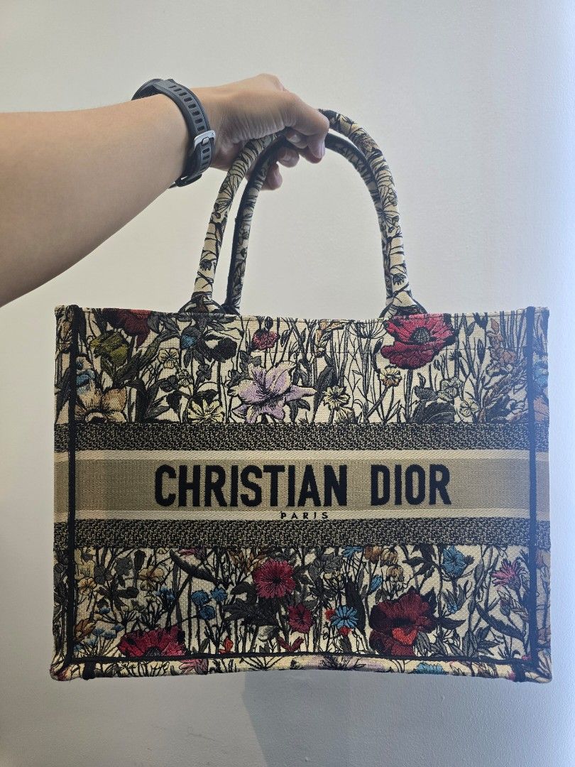 Dior Book Tote Medium Mille Fleurs Bag (Category: Luxury Bags & Wallets) located in Taguig. Submitted by mluxeph (Listing ID 1452133296, Image 1). Description: Dior Book Tote Medium Mille Fleurs Bag Gender: Ladies Material: Canvas Stamp: 50 MA 1210 Year: 2020 Interior: One Main Compartment Measurements: 14.25”L X 6.4”W X 10.9”H Handle Drop: 6.75" Hardware: None Inclusions: NONE Detailed Item Description: The item has been used but no major signs 