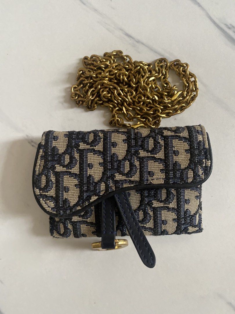 Dior Saddle Wallet with Chain (Category: Luxury Bags & Wallets) located in Manila. Submitted by great_fashion_finds (Listing ID 1452107589, Image 3). Description: - Rare Dior Saddle Wallet - Classic Dior Oblique Canvas - Gold-tone Chain Strap Included - Compact Design for Essentials - Interior 'Christian Dior Paris' Stamping.