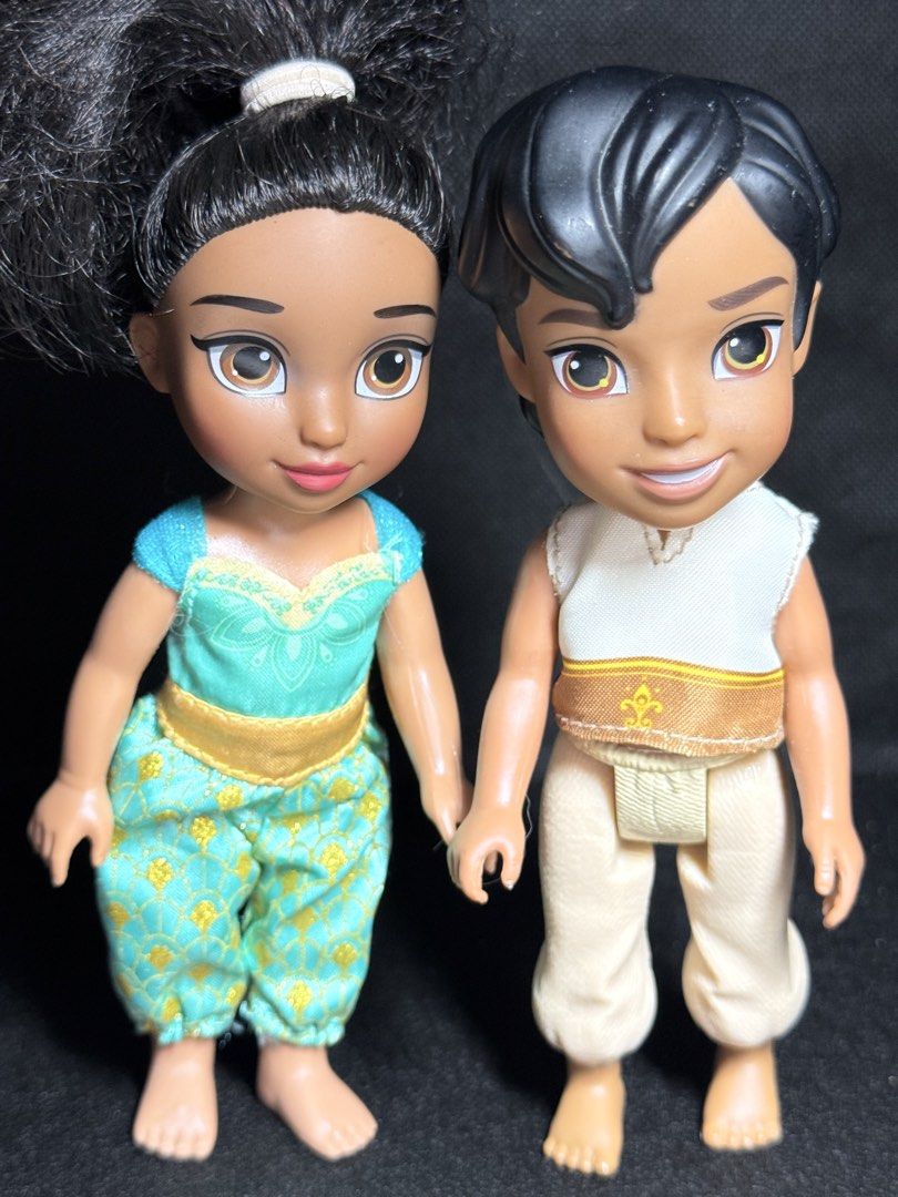 Disney Aladdin & Jasmine Toddler Dolls (Category: Babies & Kids Fashion) located in Quezon. Submitted by onlysunsun (Listing ID 1452308295, Image 2). Description: - Adorable toddler dolls of Aladdin and Jasmine. - Jasmine wears her iconic turquoise outfit with gold accents. - Aladdin is dressed in prince-like attire. - Dolls are holding hands, symbolizing their bond. - Ideal for Disney fans and collectors. - Great for imaginative playtime for tod