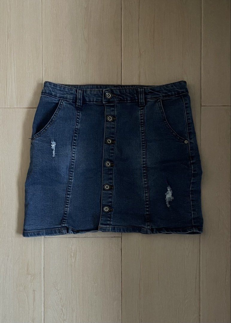 Distressed Blue Denim Skirt (Category: Skirts) located in Manila. Submitted by mixcloths (Listing ID 1452227700, Image 1). Description: • well-used but no flaws or defects •measurements: waist: 33” max, length: 15.5” • very stretchy.