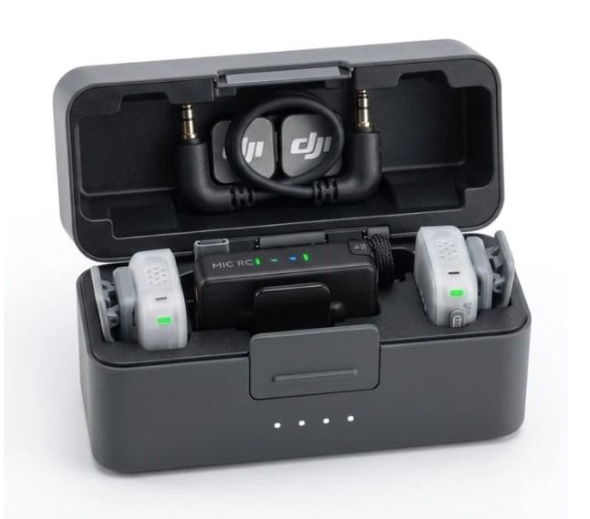 Dji Mic Mini 2 (Category: Microphones) located in Quezon City. Submitted by imax12345 (Listing ID 1452214397, Image 3). Description: - Brand: DJI - Model: Mic Mini 2 - Type: Compact wireless microphone system - Includes: 2 transmitters, 1 receiver, charging case, furry windscreens, magnetic clips, and cables - Features: Portable design, clear audio capture, versatile mounting options - Condition: Excellent, ready to use - Ideal for: Vloggers, pod