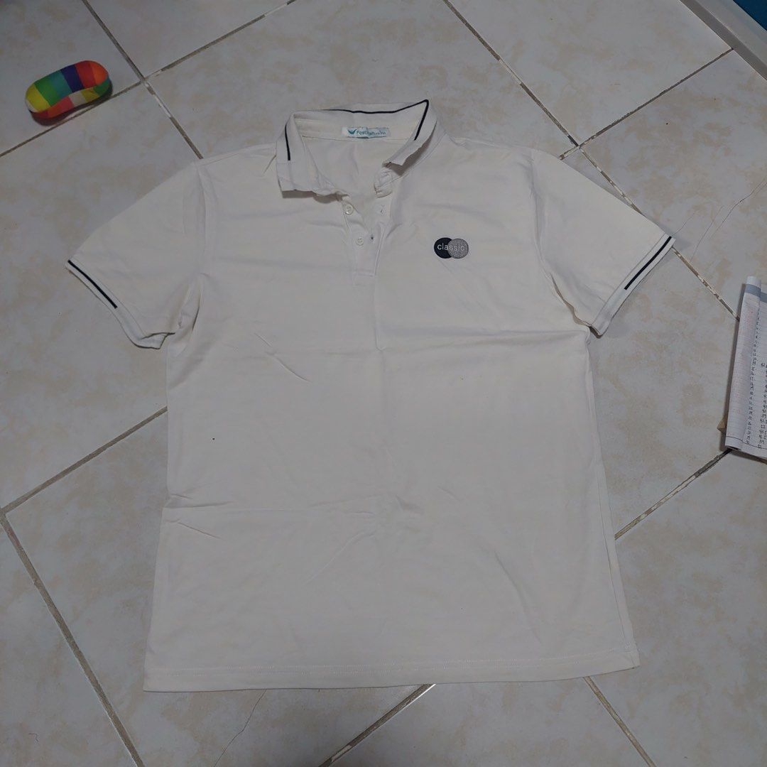 FASTFISH Men's Polo Shirt - Size Large (Category: Tshirts & Polo Shirts ) located in Quezon City. Submitted by _ysxh (Listing ID 1452134975, Image 2). Description: - Brand: FASTFISH - Size: Large - Color: white - Trim: Dark on collar and sleeves - Features: Small chest logo - Condition: Great for casual wear - Measurements: Width 49 cm, Length 65.5 cm - Shipping to be shouldered by buyer (Item is located in Quezon City) - Mode of Payment: Online 