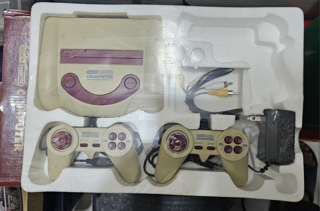 FC Compatible Computer Console with 8+1 Built-in Games (Category: Others) located in Baguio. Submitted by bitsbaguio (Listing ID 1452192476, Image 3). Description: - FC compatible computer console - 8+1 built-in games included - Simple design - Supports AV output - Comes with two controllers - Play games without a cassette - Perfect for nostalgic gaming sessions - Please note: 1. May not be compatible with all FC software 2. The power adapter is 