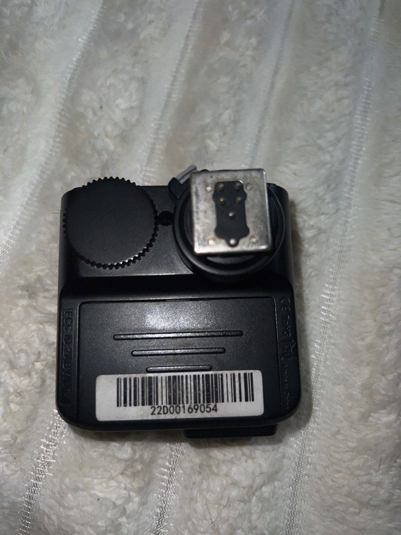 Godox X2T TTL Wireless Flash Trigger Transmitter (Category: Flashes) located in Manila. Submitted by mysticmountain-1762 (Listing ID 1452159203, Image 2). Description: - Godox X2T TTL Wireless Flash Trigger Transmitter - Compatible with Godox flashes - Control multiple groups (A, B, C, D, E) and channels - Clear LCD screen for easy settings adjustment - Hot shoe mount with locking ring for secure attachment - USB-C port for firmware updates.