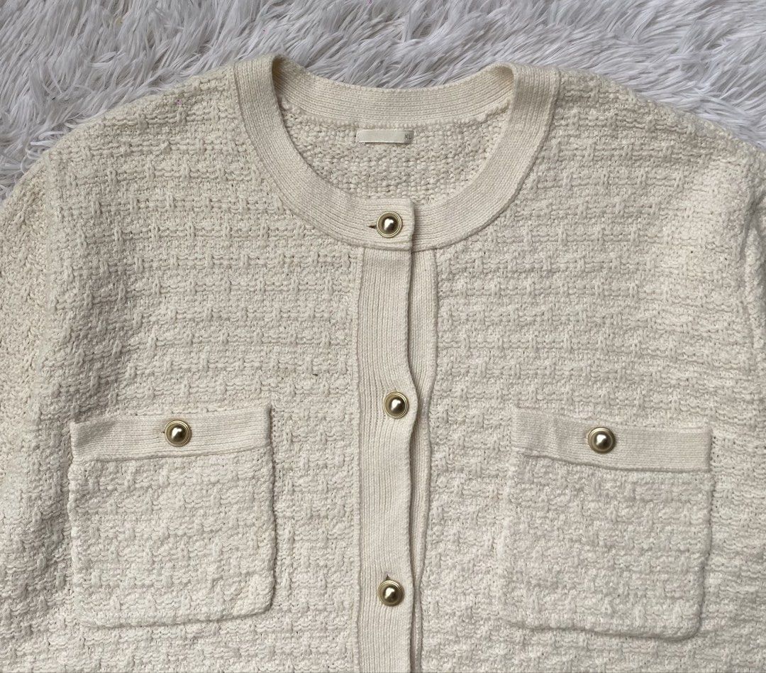 GU Cream Textured Knit Button Up Cardigan (Category: Coats, Jackets and Outerwear) located in Baguio. Submitted by levycorner (Listing ID 1452233772, Image 2). Description: - GU Cream Textured Knit Cardigan - Round neckline - Gold button details on front and pockets - Two functional front pockets - Ideal for layering over tops or dresses - Comfortable and stylish design - Dimes: Length- 21 inches Width-23 inches - Crop style.