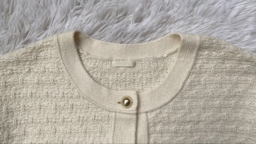 GU Cream Textured Knit Button Up Cardigan (Category: Coats, Jackets and Outerwear) located in Baguio. Submitted by levycorner (Listing ID 1452233772, Image 3). Description: - GU Cream Textured Knit Cardigan - Round neckline - Gold button details on front and pockets - Two functional front pockets - Ideal for layering over tops or dresses - Comfortable and stylish design - Dimes: Length- 21 inches Width-23 inches - Crop style.