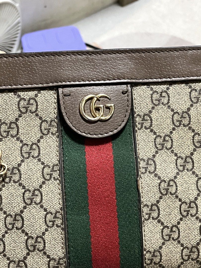 Gucci Ophidia GG Supreme Shoulder Bag (Category: Luxury Bags & Wallets) located in Cebu City. Submitted by nbetcuban007trendyfinds (Listing ID 1452202432, Image 3). Description: - Authentic Gucci Ophidia shoulder bag - Classic GG Supreme canvas - Signature green and red stripe detail - Gold-tone chain strap - Versatile for day or night use - Last pic sample only (price value at the other shops).