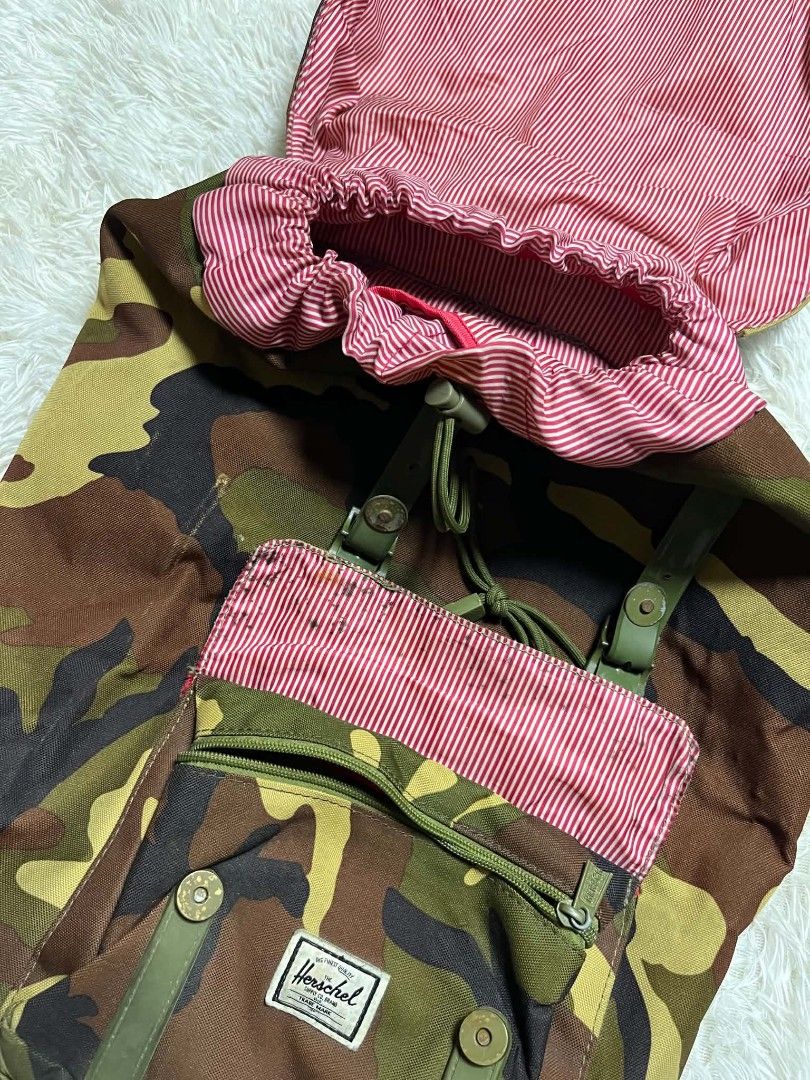 Herschel Supply Co. Camo Backpack (Category: Backpacks) located in Manila. Submitted by senggggg. (Listing ID 1452248286, Image 3). Description: good condition working zip minimal scratch check details and size.