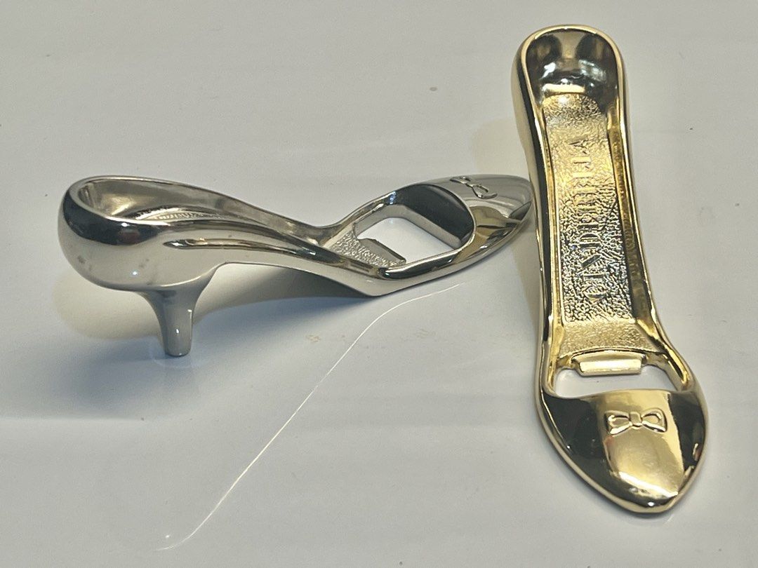 High Heel Shoe Bottle Openers - Gold & Silver Set (Category: Other Kitchenware & Tableware) located in Pateros City. Submitted by mcacompany (Listing ID 1452295638, Image 2). Description: Cute high heel shoe shaped bottle openers. One is gold, the other is silver. Fun novelty item for your bar or kitchen. Great conversation starter. Perfect for parties or as a unique gift. Sturdy metal construction Find many great new & used options and get the b