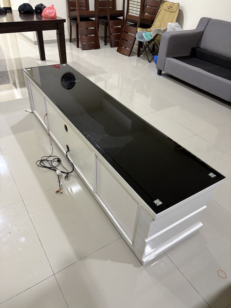 High Quality Modern TV Cabinet / Console 6.8ft (Category: TV Consoles) located in Senai. Submitted by fitrinazmi (Listing ID 1452251470, Image 2). Description: Condition : 8/10 Dimension : 6.8ft L x 1.5ft W x 1.5ft H Material : High Grade Wood ( Super Heavy) Colour : White Accessories : spotlight, glass top cover, glass compartment cover Reason to sell : house clearance Nego till let go Self Pickup / buyer to arrange delivery, Nilai, Negeri Sembi