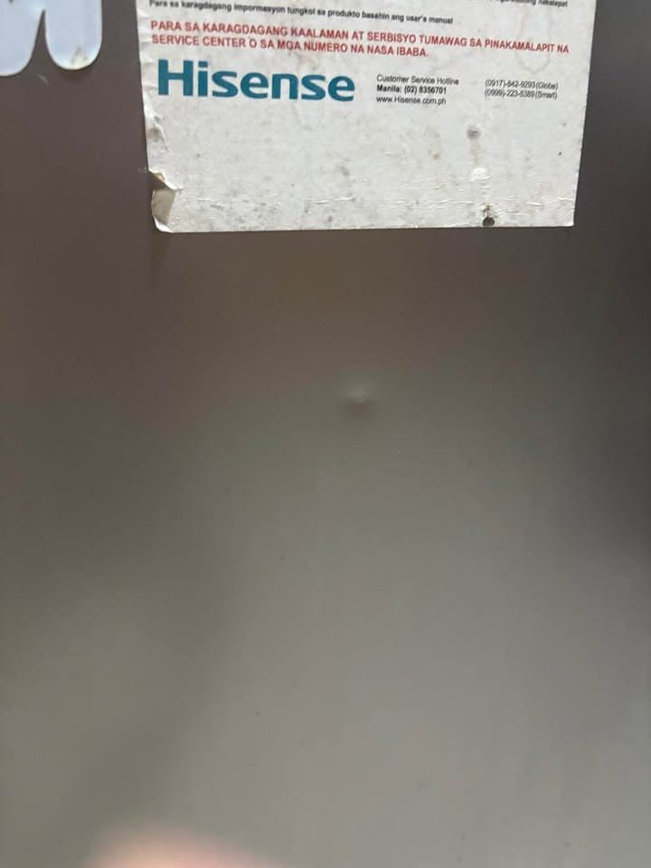 Hisense RS-12DR2S Mini Refrigerator (Category: Refrigerators and Freezers) located in Caloocan City. Submitted by angelo08_wolf (Listing ID 1452233197, Image 2). Description: - Hisense Mini Fridge (Model RS-12DR2S) - Capacity: 94L Gross / 90L Net - Condition: Works well, clean interior with shelves - Cosmetic Notes: Stickers on front (Family Dad Mom, VW, Matchbox), small dent on top right corner - Perfect for: Dorm rooms, small apartments, or any