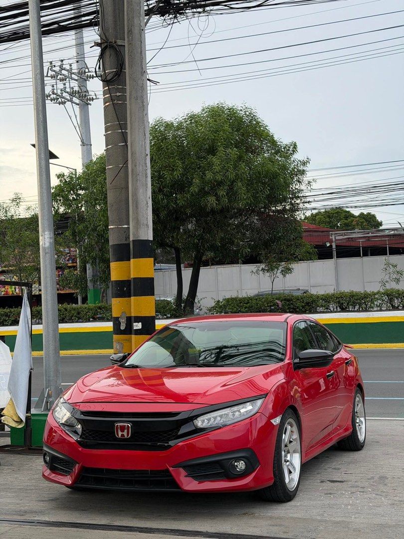 Honda Civic RS Turbo Auto (Category: Used Cars) located in Manila. Submitted by ady.jpg (Listing ID 1452205364, Image 3). Description: 2017 Honda Civic RS turbo 50k+ odo only orig not tampered Total upgrades ng unit! Lowered suspension New set of Mags and tires Trunk Subwoofer Engine strut bar Brand new amaron battery Underglow Installed (Red) Full exhaust system Mitsuba Arena 3 installed No history of accident No history of flood No HPG alarms a