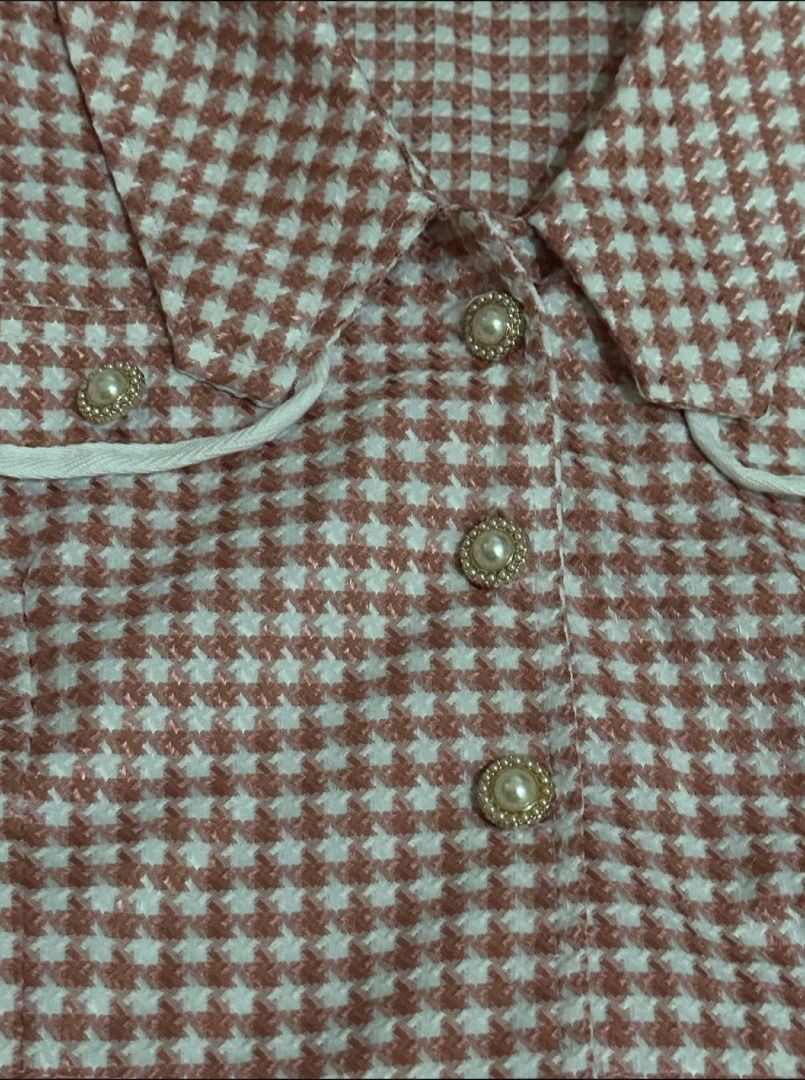 Houndstooth Tweed Collared Top and Shorts Set (Category: Sets or Coordinates) located in Makati City. Submitted by _rentorbuy (Listing ID 1452214617, Image 3). Description: - Houndstooth print, tweed fabric set - Includes cropped jacket and matching shorts - White trim and pearl button details - Perfect for a chic and stylish look.