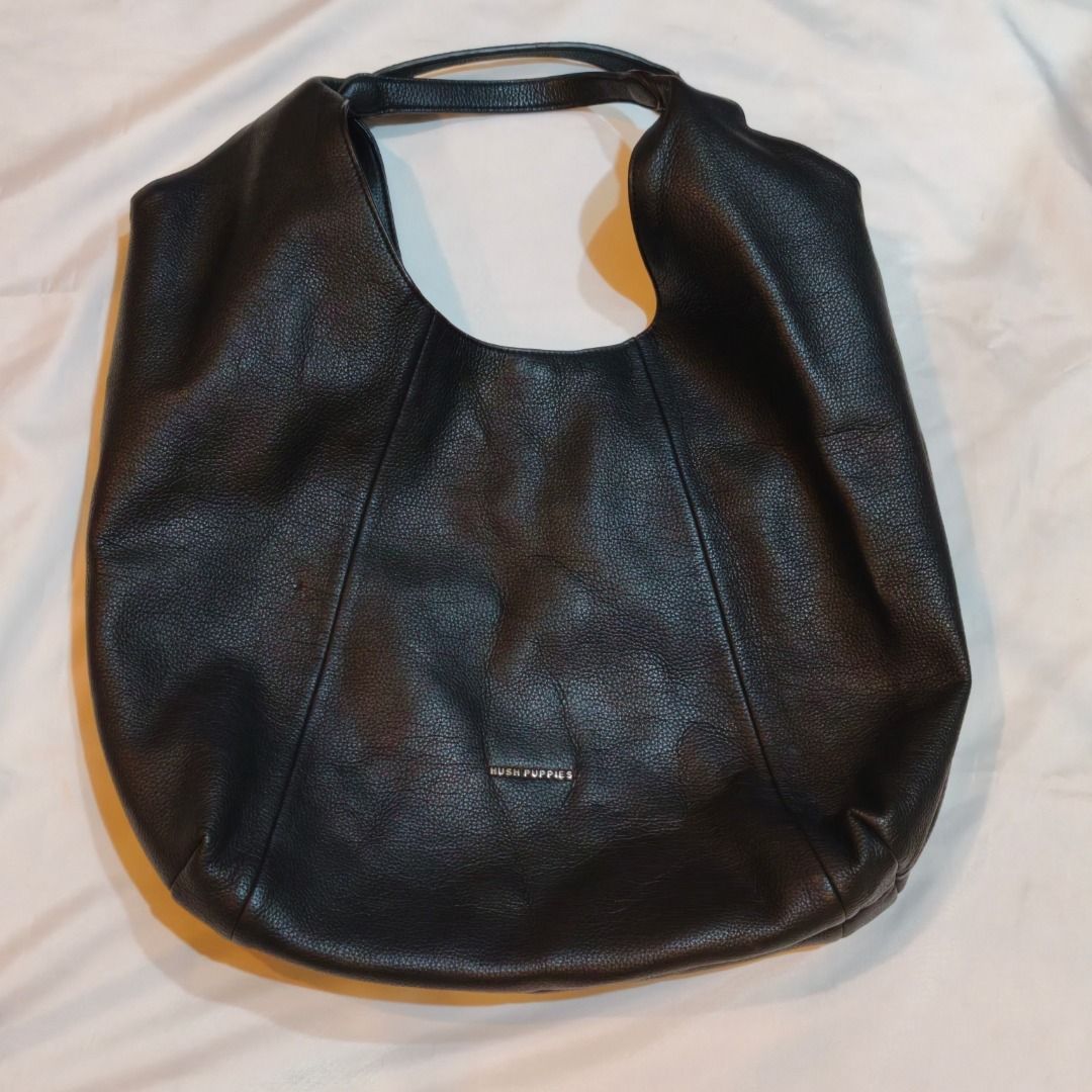 Hush Puppies Black Leather Hobo Shoulder Bag Authentic Original 100% (Category: Shoulder Bags) located in Kuala Lumpur. Submitted by supergadgetz (Listing ID 1452314919, Image 1). Description: - Hush Puppies black leather hobo bag Authentic Original 100% - Textured leather material - Magnetic snap closure - Interior zip pocket and slip pockets - Clean inside and out - Great everyday bag.