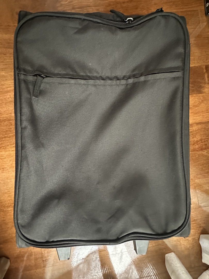 IKEA cabin size foldable luggage (Category: Luggages) located in Kuala Lumpur. Submitted by joytpm (Listing ID 1452192229, Image 1). Description: - foldable black rolling luggage - Front zip pocket - Main compartment - Interior has some stains - Wheels and extendable handle are functional - Great for your next trip!.