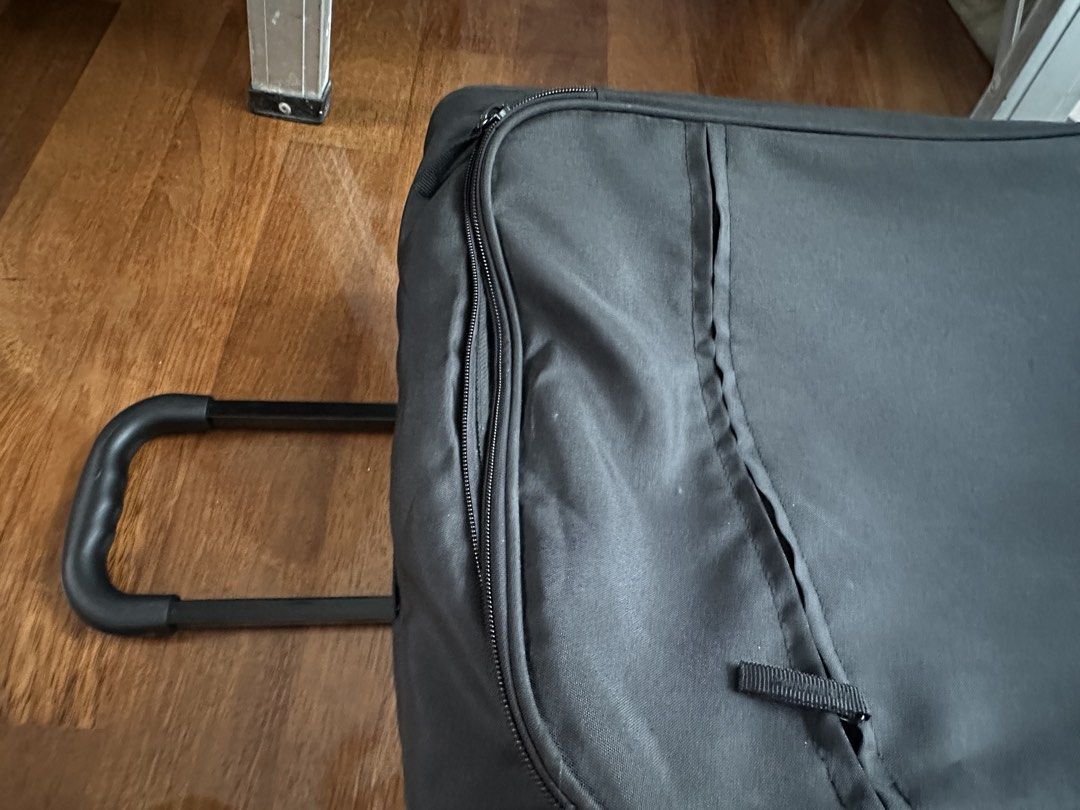 IKEA cabin size foldable luggage (Category: Luggages) located in Kuala Lumpur. Submitted by joytpm (Listing ID 1452192229, Image 2). Description: - foldable black rolling luggage - Front zip pocket - Main compartment - Interior has some stains - Wheels and extendable handle are functional - Great for your next trip!.