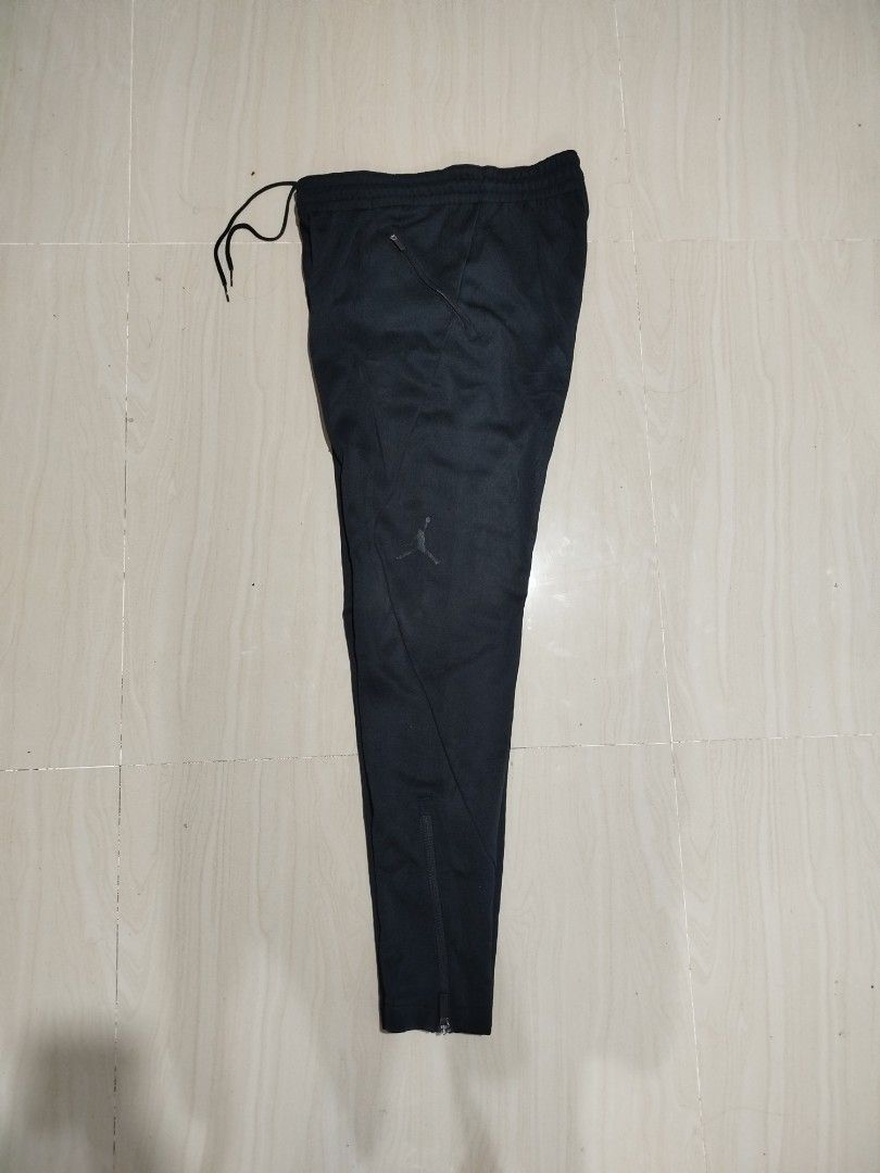 Jordan Black Track Pants Joggers Size M (Category: Joggers) located in Alburquerque. Submitted by dr0p-a-dr1p (Listing ID 1452263172, Image 2). Description: Waist: 28-32 Length: 40 - Black Jordan track pants - Size: Medium (M) - Iconic Jumpman logo on the leg - Zippers at the ankle for adjustable fit - Comfortable drawstring waist - Ideal for casual wear or athletic activities.