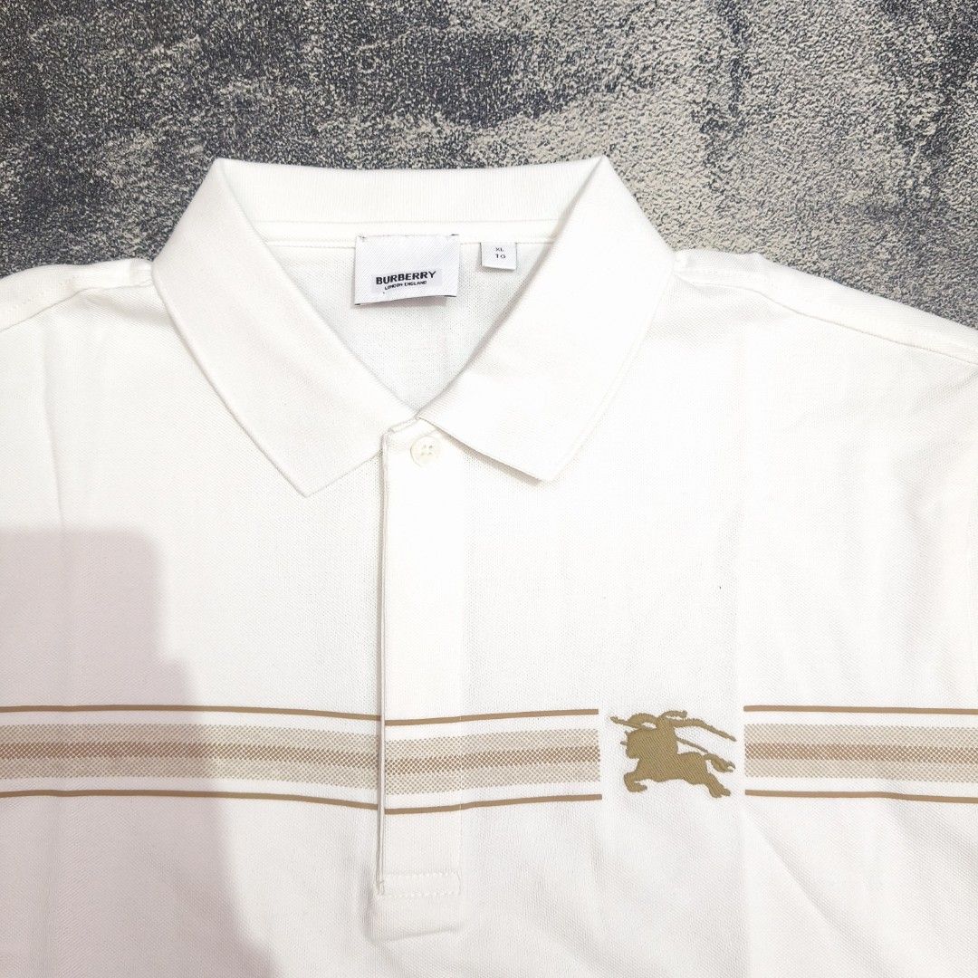 Kaos T-shirt Polo Burberry white logo bordir second bekas (Kategori: Atasan) berada di Cilegon. Dikirim oleh prelovedavenue. (ID iklan 1452191859, Gambar 2). Deskripsi: Used Very good condition Size XL PxL 73*55.