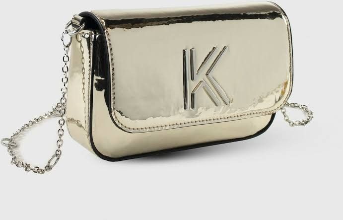 Kendall + Kylie Metallic Clutch Bag (Category: Clutches) located in Manila. Submitted by princegar32511 (Listing ID 1448461979, Image 3). Description: - Kendall + Kylie metallic clutch bag - Features brand logo on the front - Comes with original tag - Black interior - Secure magnetic closure - Ideal for nights out and special occasions.