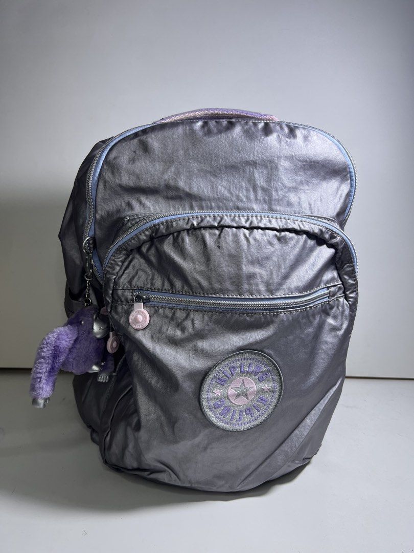 Kipling Seoul Large 15" Laptop School Backpack “Star Pop” Silver Metallic (Category: Backpacks) located in Muntinlupa City. Submitted by remshop (Listing ID 1452140773, Image 1). Description: - bought in zalora for 8k+ - no flaws, one of my favorite bags but just dont fit in my wardrobe palette anymore - used 2-3 times - if interested buyer will send you more pics Star Pop Collection Color: Silver Metallic Nylon Dimensions: 12.75” L x 17.25” H x 