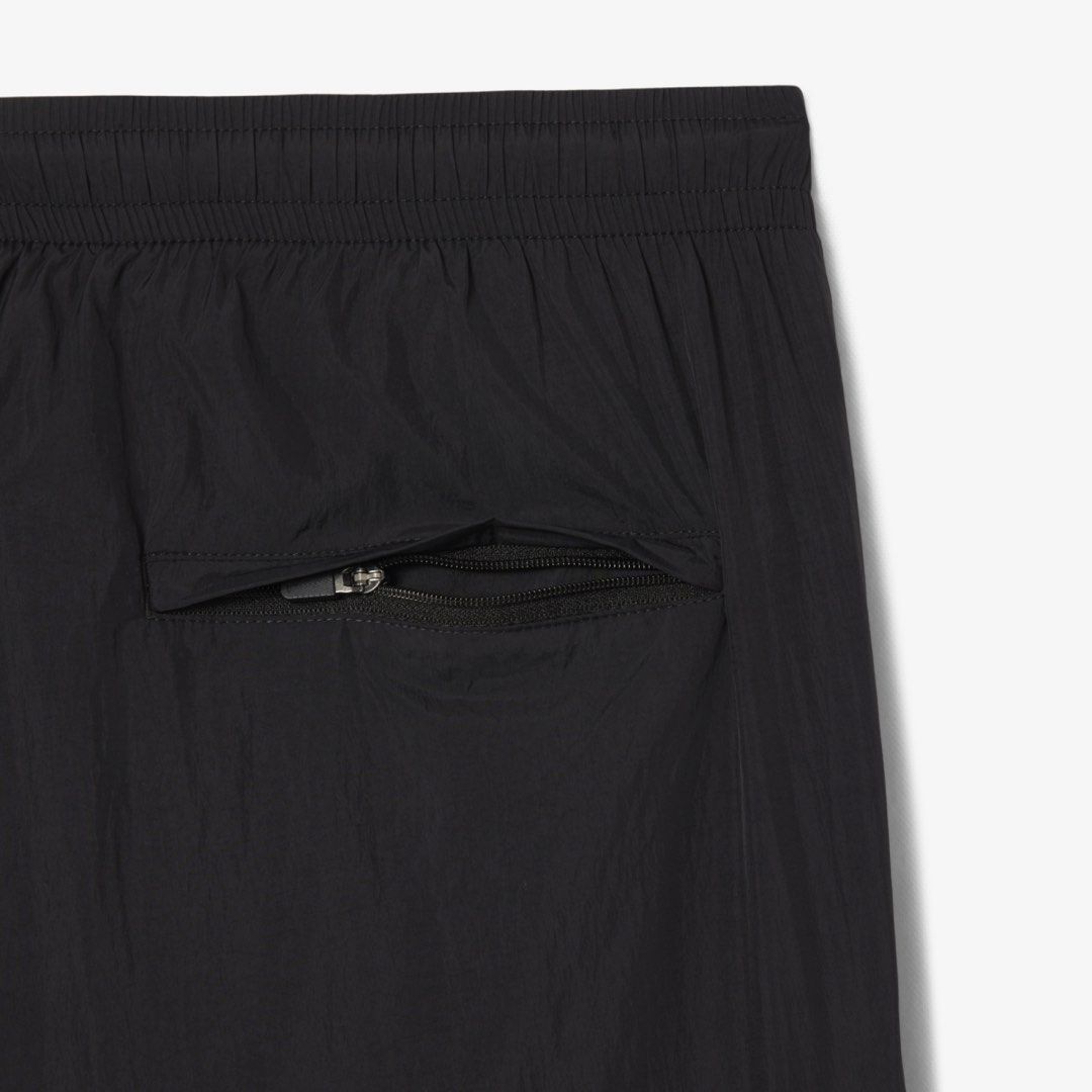 Lacoste Lightweight Water-Repellant Sweatpants (Category: Activewear) located in Quezon City. Submitted by labnstyle (Listing ID 1452278198, Image 3). Description: Bought in Korea 7950 in PH store Color: Navy blue Size: FR 3 Small. Can fit small to semi-large. Unisex Actual pics for sure buyer only. Price still slightly neg. Description: Made from taffeta for a lightweight, breathable finish, with water-repellent coating to keep you dry. A timele