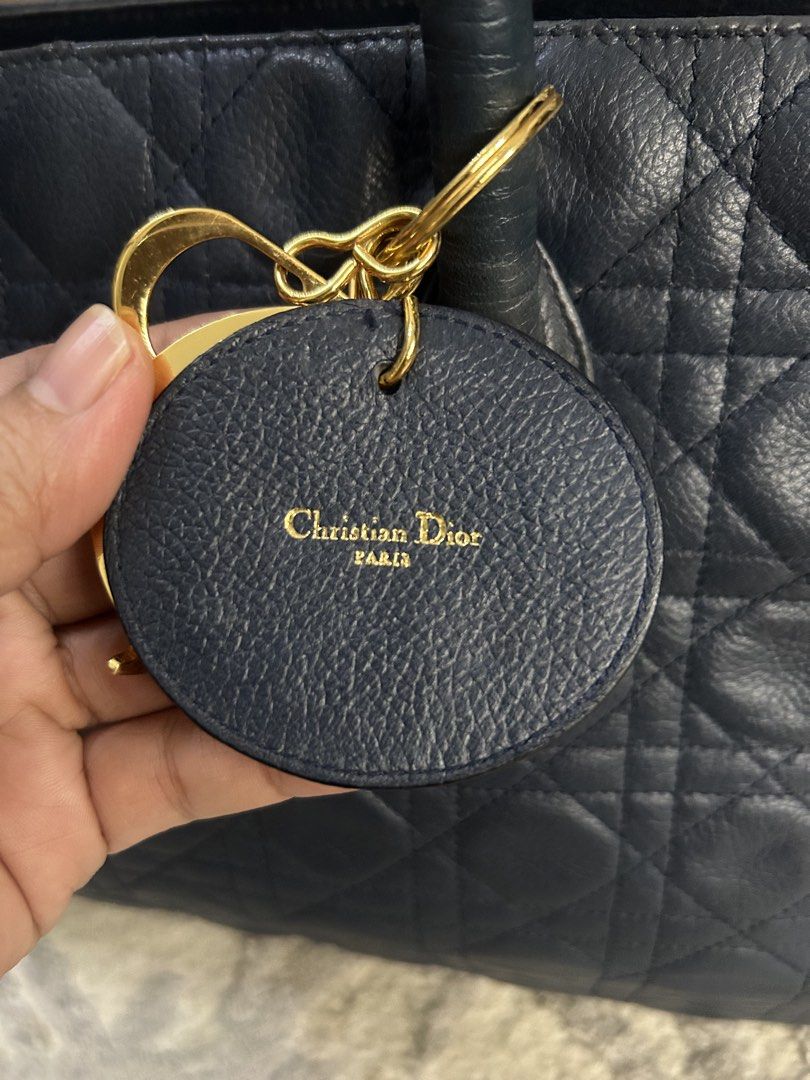 Lady Dior Cannage Tote (Category: Luxury Bags & Wallets) located in Paranaque City. Submitted by luxehuntsmla.bymari (Listing ID 1452253676, Image 3). Description: 💯% Authentic Lady Dior Cannage Tote 🔸Pre-loved 🔸Much darker blue in actual 🔸excellent condition 🔸 normal signs of wear 🔸No foul smell 🔸Comes with Legit Grails Certification 🤍 Php 43,000 only 🔘🔘🔘 All items posted are guaranteed authentic or your money-back if proven fake by a