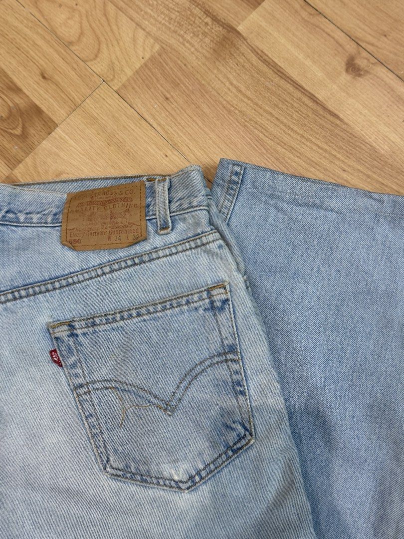 Levi's 550 Jeans Light Wash (Category: Jeans) located in Cebu City. Submitted by aweful.wire (Listing ID 1452234412, Image 3). Description: Levi’s 550 Light Wash Denim (34x32 on Back tab) W: 34” L: 39.5” L.O: 8.5” - Classic light wash Levi's 550 jeans - Size: W34 L32 - Fit: Straight - Closure: Button fly with zipper - Features: Iconic red tab and leather patch - Condition: Minor marks consistent with wear - Style: Great staple piece for any wardr