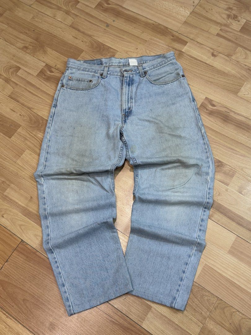 Levi's 550 Jeans Light Wash (Category: Jeans) located in Cebu City. Submitted by aweful.wire (Listing ID 1452234412, Image 2). Description: Levi’s 550 Light Wash Denim (34x32 on Back tab) W: 34” L: 39.5” L.O: 8.5” - Classic light wash Levi's 550 jeans - Size: W34 L32 - Fit: Straight - Closure: Button fly with zipper - Features: Iconic red tab and leather patch - Condition: Minor marks consistent with wear - Style: Great staple piece for any wardr