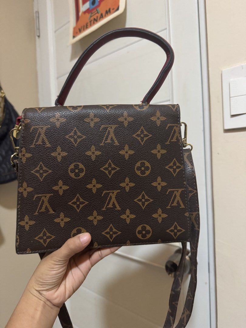 Louis Vuitton Monogram Canvas & Burgundy Leather Handbag (Category: Luxury Bags & Wallets) located in Davao. Submitted by ereaderscorner (Listing ID 1452200583, Image 2). Description: Bought from New Zealand Authentic Location: Tugbok, Davao City.