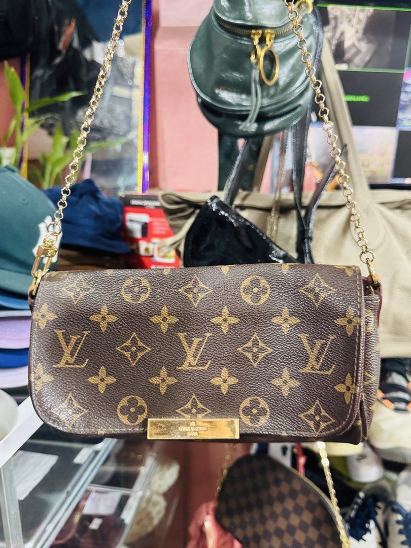 Louis Vuitton Monogram Canvas Shoulder Bag (Category: Luxury Bags & Wallets) located in Manila. Submitted by wildbear.e10374 (Listing ID 1452227627, Image 1). Description: - Classic Louis Vuitton shoulder bag - Monogram canvas with leather trim - Gold chain strap - Interior Louis Vuitton Paris, made in France tag - Small and compact, ideal for essentials - Timeless piece for your collection.