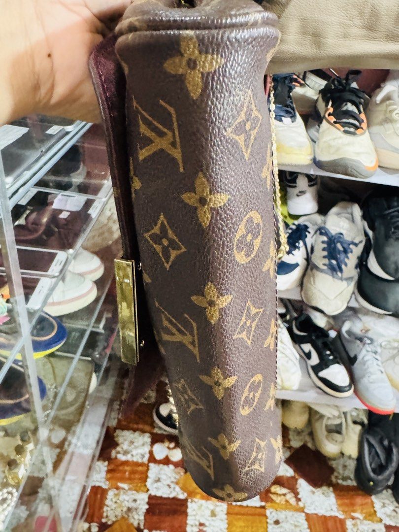 Louis Vuitton Monogram Canvas Shoulder Bag (Category: Luxury Bags & Wallets) located in Manila. Submitted by wildbear.e10374 (Listing ID 1452227627, Image 2). Description: - Classic Louis Vuitton shoulder bag - Monogram canvas with leather trim - Gold chain strap - Interior Louis Vuitton Paris, made in France tag - Small and compact, ideal for essentials - Timeless piece for your collection.