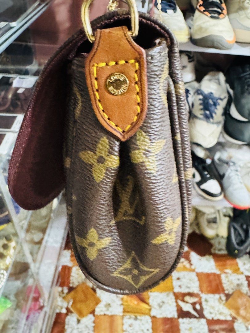 Louis Vuitton Monogram Canvas Shoulder Bag (Category: Luxury Bags & Wallets) located in Manila. Submitted by wildbear.e10374 (Listing ID 1452227627, Image 3). Description: - Classic Louis Vuitton shoulder bag - Monogram canvas with leather trim - Gold chain strap - Interior Louis Vuitton Paris, made in France tag - Small and compact, ideal for essentials - Timeless piece for your collection.