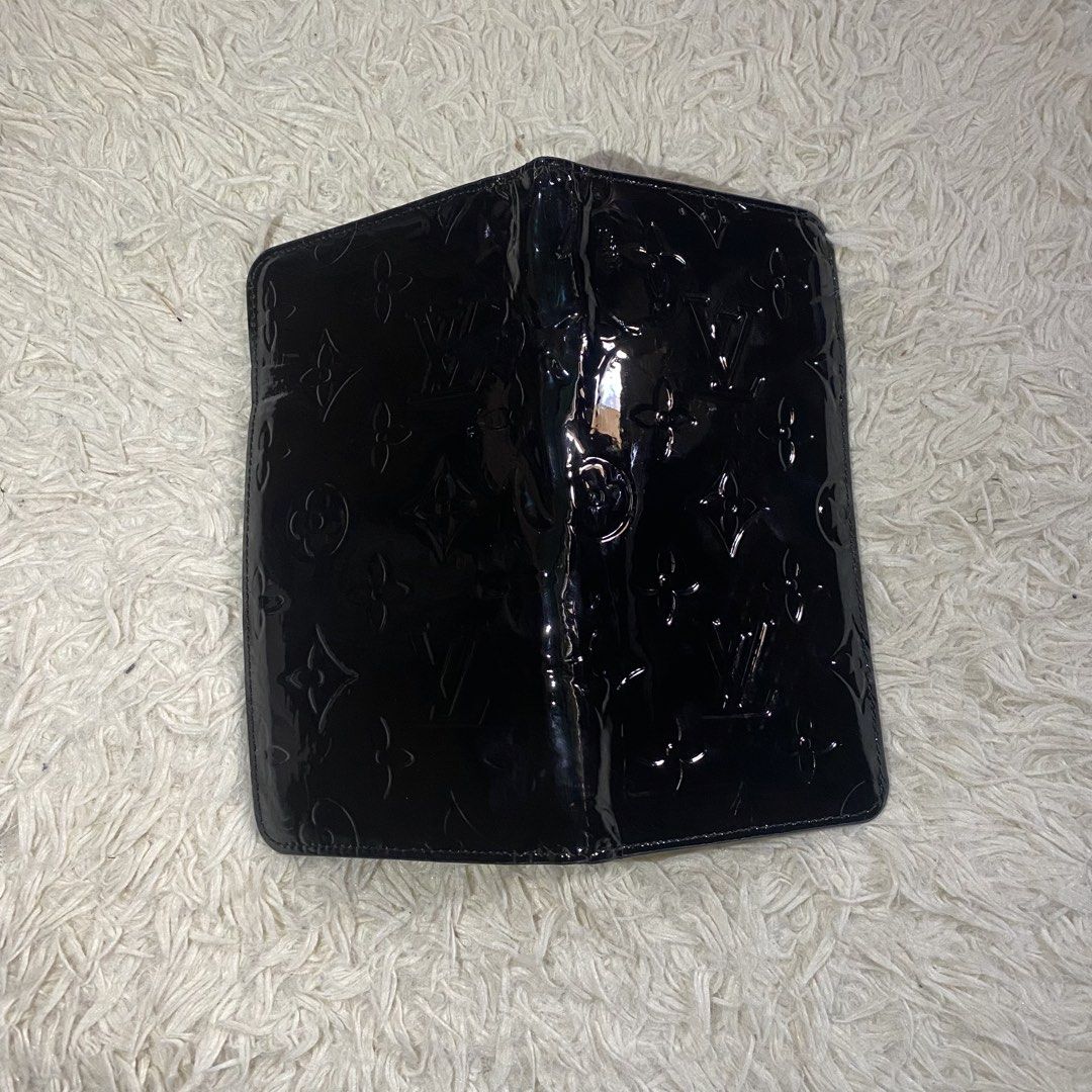 Louis Vuitton Monogram Vernis Wallet (Category: Luxury Bags & Wallets) located in Cebu City. Submitted by stevenkylegil (Listing ID 1452166611, Image 3). Description: - Authentic Louis Vuitton wallet - Black Monogram Vernis leather - Multiple card slots for organization - Comes with authenticity card - Classic and essential accessory.