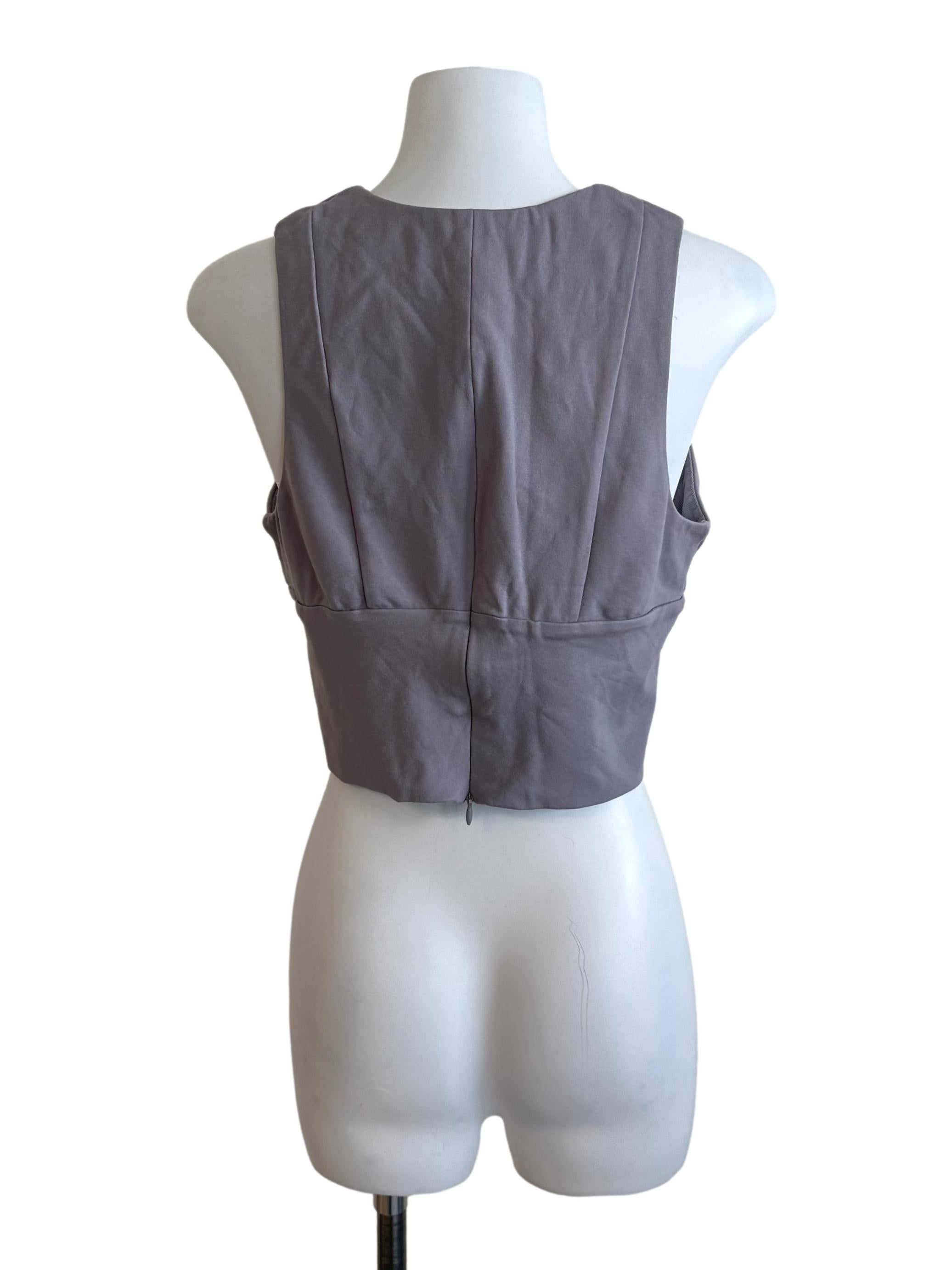 Love Bonito Dark Grey Deep V Neck Crop Top (Category: Sleeveless) located in Kuala Lumpur. Submitted by refashmy (Listing ID 1452269146, Image 2). Description: [Brand] Love Bonito [Description] Functional Back Zip Fully Lined Non Stretchable Material Main: 60% Rayon, 34% Nylon, 6% Spandex. Lining: 65% Polyester, 35% Spandex [Measurements] Size M PTP - 16'' Waist - '' Length - 15.5'' [Condition] Please allow 0.5-1 inch difference in our given meas
