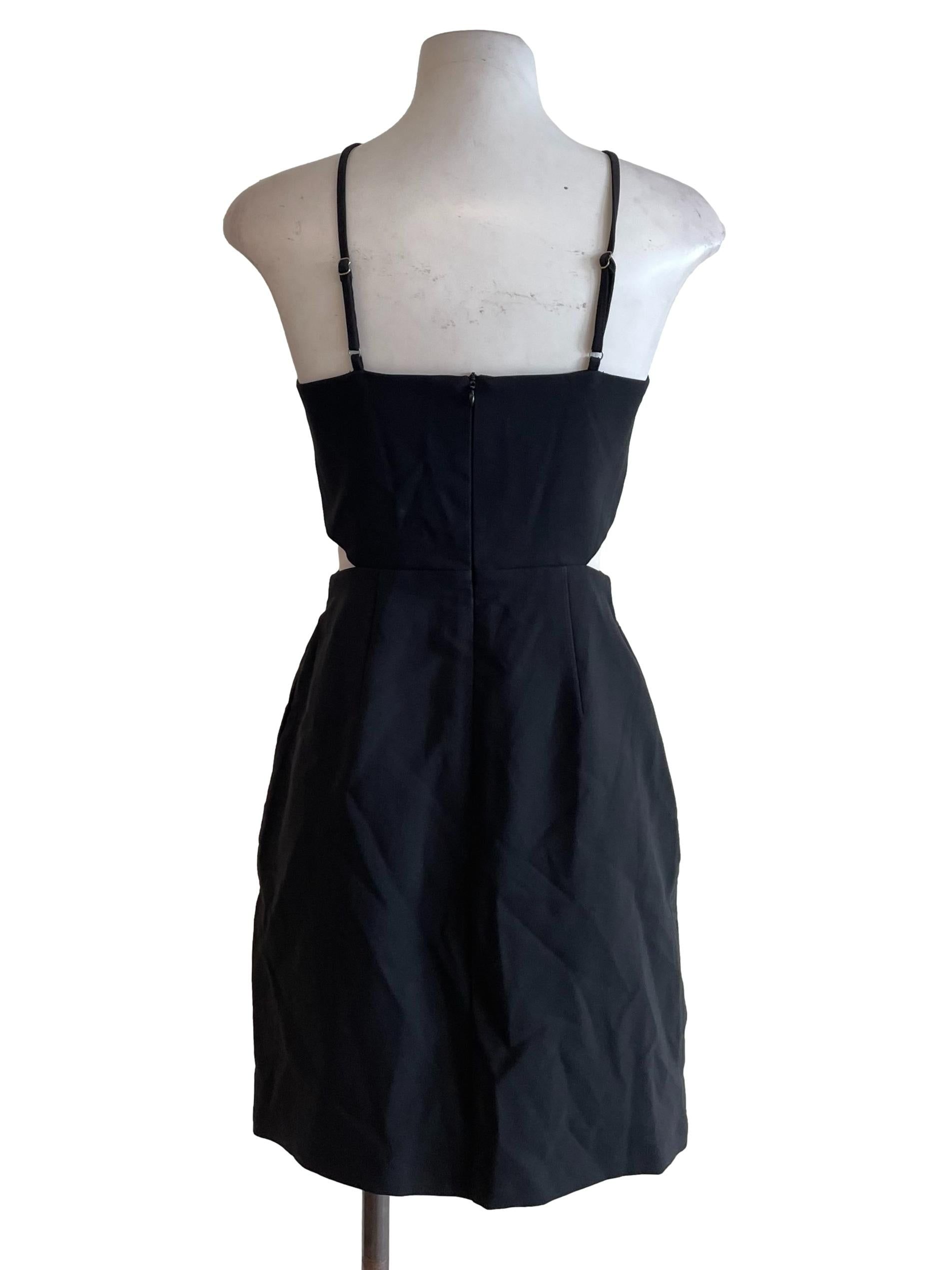 Lovet Charcoal Open Waist Halter Neck Dress (Category: Dresses) located in Kuala Lumpur. Submitted by refashmy (Listing ID 1452222433, Image 2). Description: [Brand] Lovet [Description] Functional Back Zip Fully Lined Non Stretchable Material [Measurements] Size XS PTP - 13'' Waist - 11'' Hips - 16'' Length - 32'' [Condition] Lints Please allow 0.5-1 inch difference in our given measurements. Any variance within this range may not be considered a