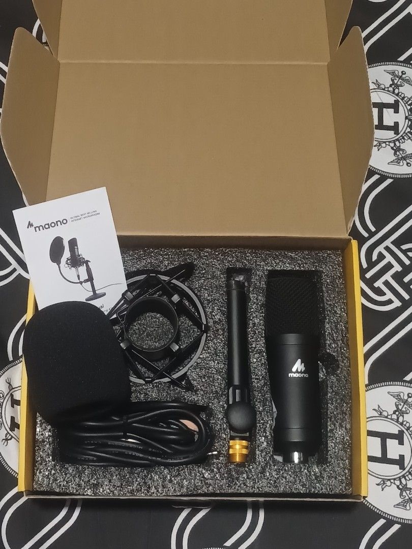 Maono AU-A03T Desktop Podcasting Microphone Kit (Category: Microphones) located in Manila. Submitted by gimoteajan82249 (Listing ID 1452200754, Image 2). Description: Maono AU-A03T Desktop Podcasting Microphone Kit - Includes: Microphone, Shock Mount, Pop Filter, Cable - Ideal for: Streaming, Voiceovers, Recording - Everything you need to start - Box opened, but all contents appear unused NEGO NEGO.