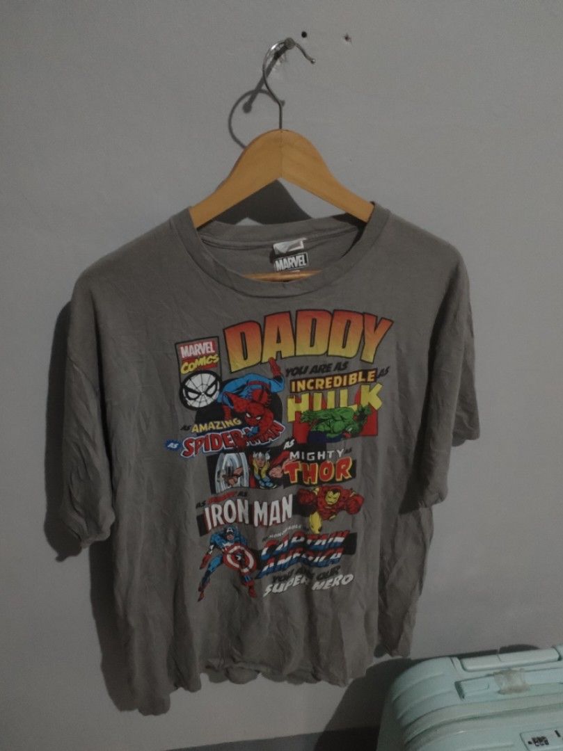 Marvel Comics Daddy Graphic T-Shirt XL (Category: Tshirts & Polo Shirts ) located in Naga. Submitted by basejohnpa64527 (Listing ID 1452125464, Image 1). Description: - Grey Marvel Comics T-Shirt for Daddy - Features Spiderman, Hulk, Iron Man, Thor, and Captain America - "Daddy you are as incredible as Hulk, as amazing as Spiderman, as mighty as Thor, as strong as Iron Man, and our super hero" graphic - Size: XL -Very Good Cond - Ideal gift for d