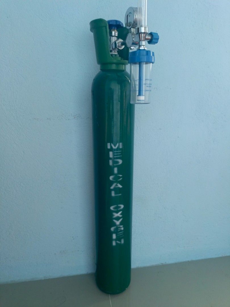 Medical Oxygen Cylinder with Flow Meter and Regulator (Category: Medical Supplies & Tools) located in General Trias. Submitted by sssean143 (Listing ID 1452197752, Image 1). Description: - Green medical oxygen cylinder - Includes flow meter and regulator for controlled oxygen delivery - Flow meter with clear adjustment markings - Attached pressure gauge - Need to refill - Please check photos for details.