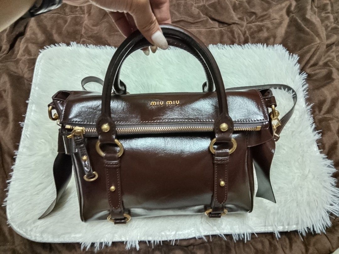 Miu Miu 2 way bag (Category: Luxury Bags & Wallets) located in Baguio. Submitted by luxuryitembags (Listing ID 1452159086, Image 1). Description: 2nd hand bag In a good condition no issues Dustbag inclusions only Negotiable price.
