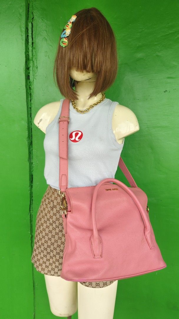 Miu Miu Pink Leather Shoulder Bag (Category: Luxury Bags & Wallets) located in Tambulig. Submitted by cmscloset_ph (Listing ID 1452132009, Image 3). Description: - Genuine pink Miu Miu leather bag - Versatile: Top handles and detachable shoulder strap - Elegant gold hardware details - Secure zipper closure - MADE in TURKEY ON BLACK TAG 🖤 - Ideal for everyday style and practicality.
