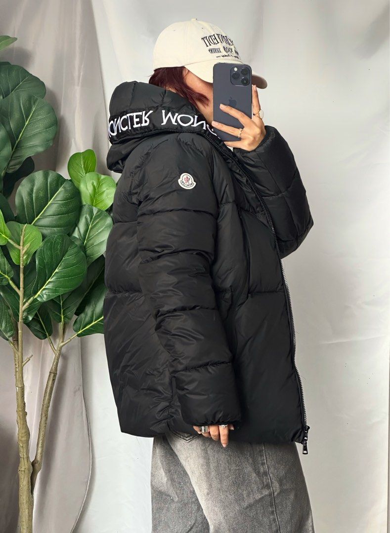 Moncler Black Puffer Jacket with Logo Detail (Category: Coats, Jackets and Outerwear) located in Valenzuela. Submitted by watnbtem_16 (Listing ID 1452305464, Image 3). Description: - Authentic Moncler black puffer jacket - Features iconic Moncler logo on hood lining and sleeve patch - Zip-up front closure for easy wear - Convenient pockets for essentials - Warm and stylish design, ideal for colder weather - A must-have designer piece for your war